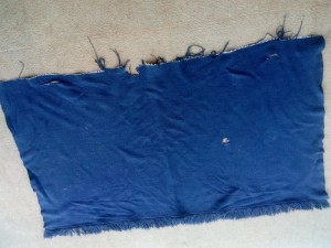 Alte Decke aus Hundekörbchen